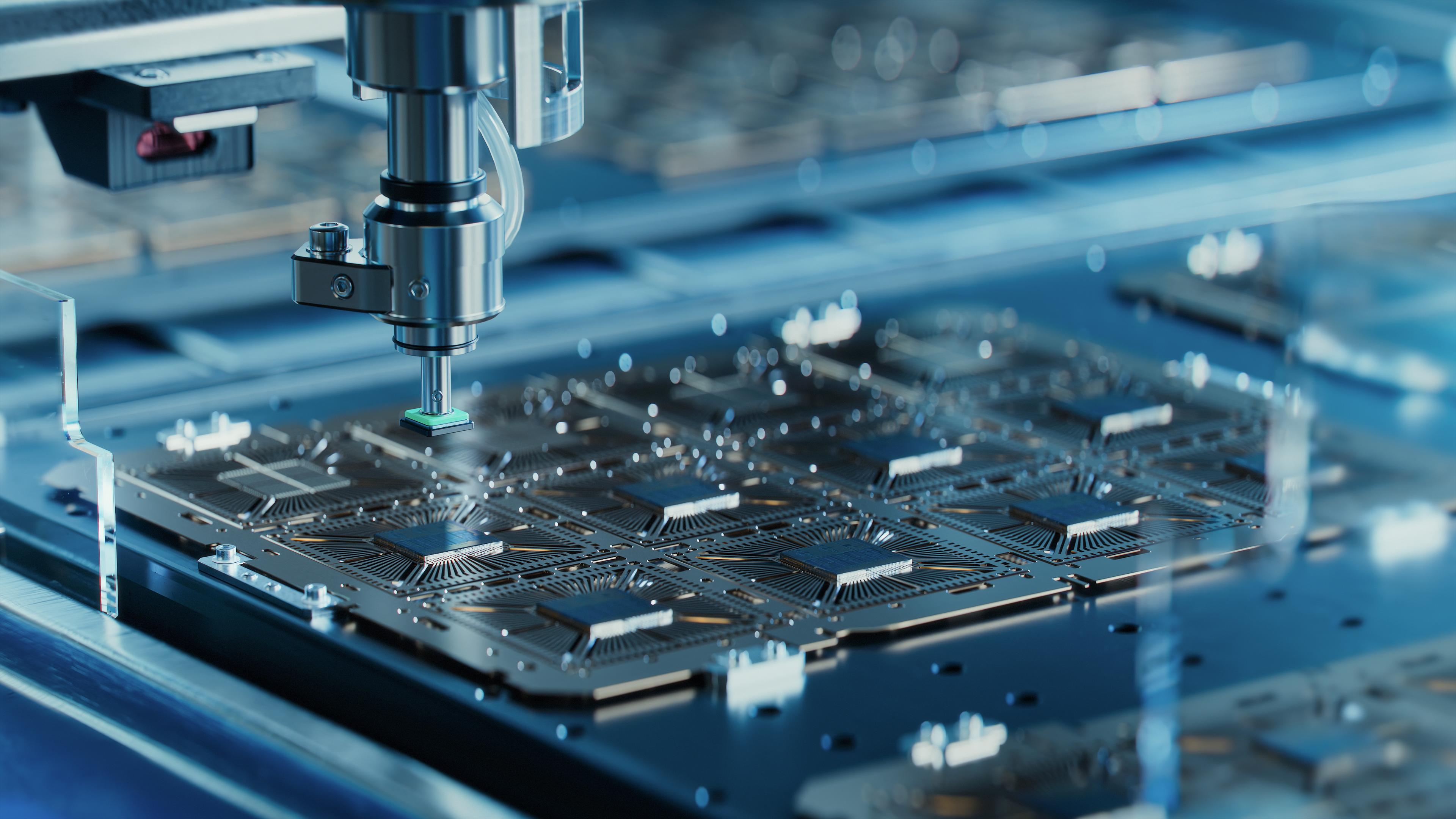 Automated machine assembling rows of microchips